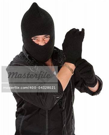 Angry burglar wearing a black woollen mask