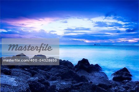 sunset in the sea with blue color