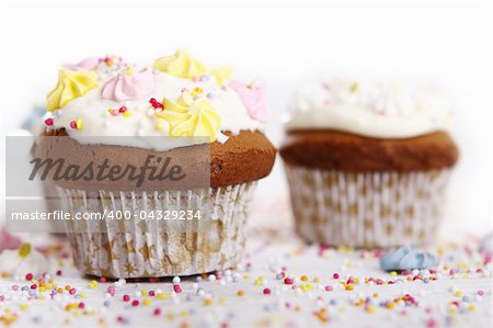 Holiday cupcakes decorated with colorful flowers