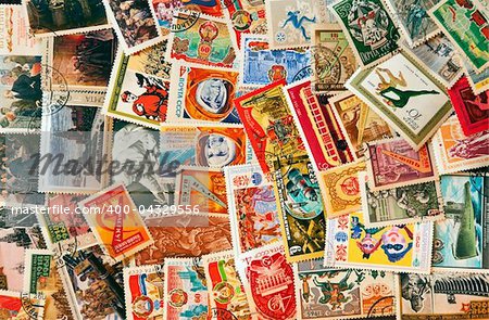 Pile of used post stamps from Soviet Union - Lenin, astronauts, revolution, sociaslism, etc...