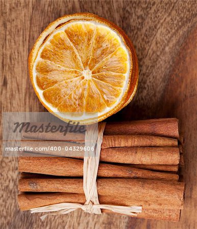 Slices of dried Orange with cinnamon sticks