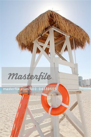 Baywatch sunroof Caribbean beach hut wood and dried grass roof