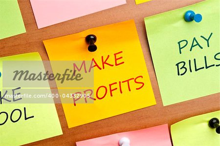 Make profits post it on wooden wall