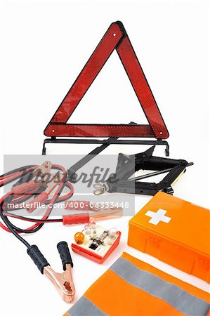 Emergency kit for car - first aid kit, car jack, jumper cables, warning triangle, light bulb kit