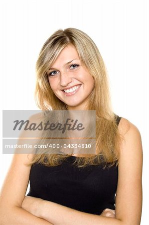 Young woman shows off her beautiful teeth. Isolated on white background