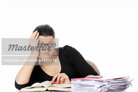 Bored young student woman at the desk , isolated on white background