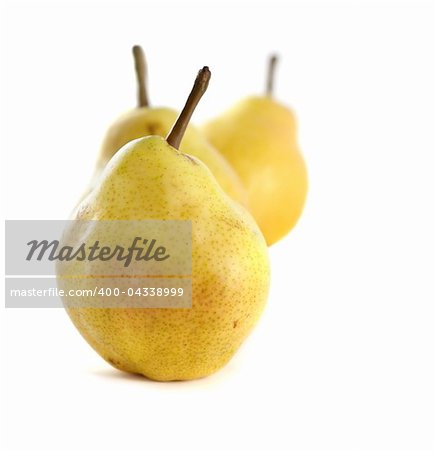 Three green pears. On a white background