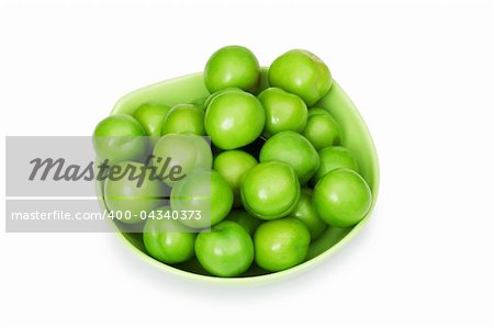 Green plums isolated on the white background