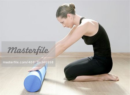 blue foam roller pilates woman sport gym fitness yoga wood floor