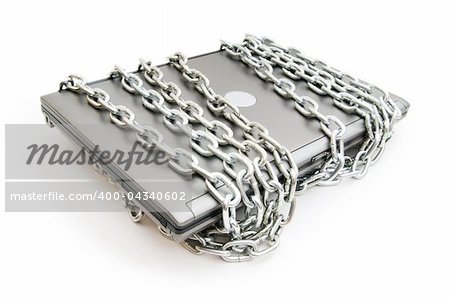 Computer security concept with laptop and chain