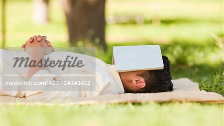 Man sleeping with his book