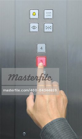 businessman hand press 3 floor in elevator