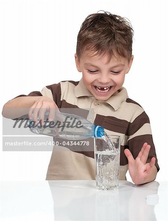 Portrait of a cute boy having a bottle of refreshing water - isolated on white