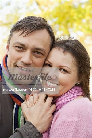 happy nice couple in a park