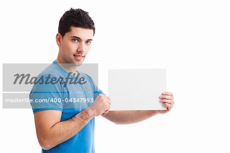 Young guy holding a blank bill board isolated on white background