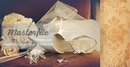 Wedding shoes with veil  on velvet chair