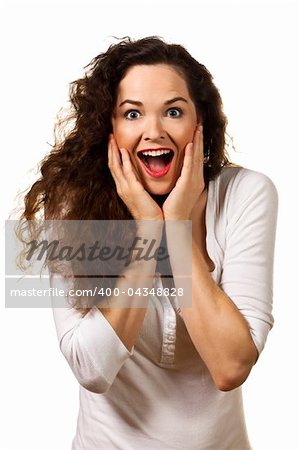 Beautiful young surprised woman looking at camera. Isolated over white.
