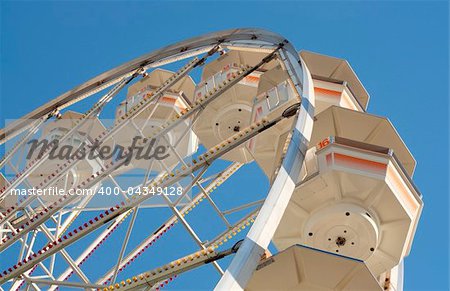 Retro Ferris Wheel Against Blue Sky in Myrtle Beach, SC, USA.
