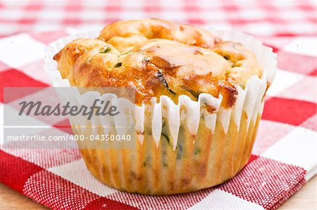 Freshly baked spinach and cheese muffins ready to be served