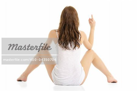 woman sitting on the floor and shows middle finger isolated on white