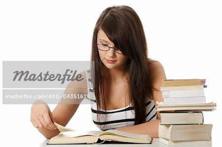 Young student woman with lots of books studing for exams. isolated on white background