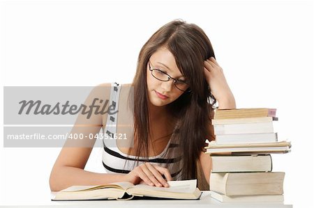 Young student woman with lots of books studing for exams. isolated on white background