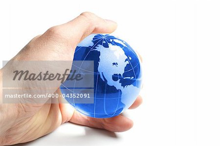 environmental protection or eco concept with world in a hand on white