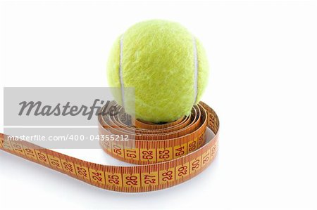 Tennis ball and  measuring tape on  white background