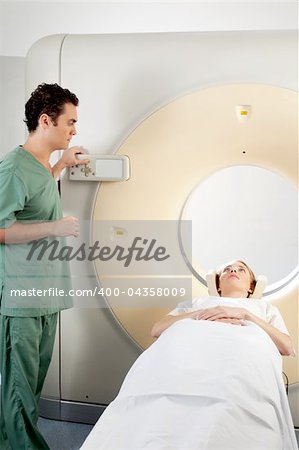 A patient and CT Scan Technician preparing for an x-ray