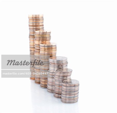 Coins  towers on white background