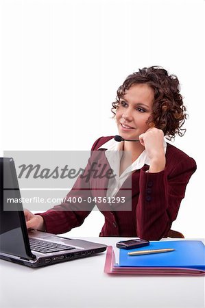 Smiling girl with headset in call center. Attractive businesswoman with headset and laptop on white background