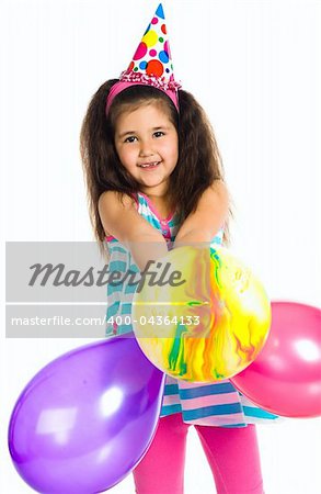 Little girl in birthday cap isolated on white