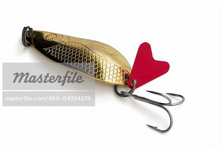 Old  brass fishing lure isolated on white