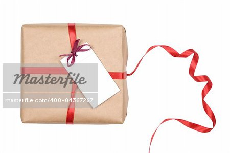 gift box with red ribbon and blank label on white background