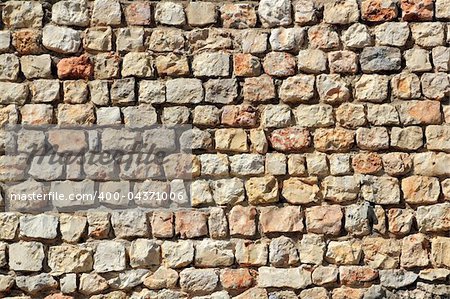 brown masonry stone wall Spain traditional ancient construction