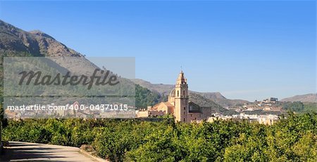 Simat de la Valldigna village and Monasterio Santa Maria orange fields