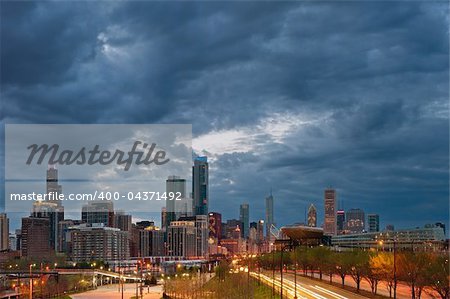 Image of Chicago downtown with dramatic sky.