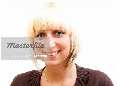 An attractive young woman with blue eyes smiled at us