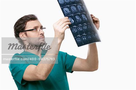 Doctor examines x-rays the patient is isolated