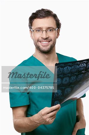Attractive doctor with x-rays on a white background