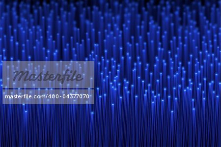 Abstract fiber optic background in a concept of technology of computer processing and the future of communication.