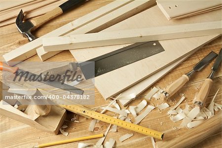 Wooden workshop table with tools.