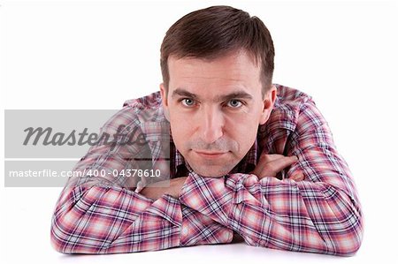 Attractive Man on a table. Isolated on white background.