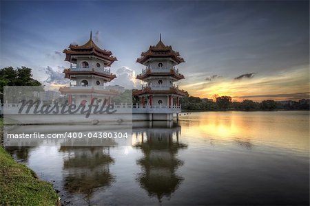 Twin Pagodas at Singapore Chinese Garden Lake at Sunset
