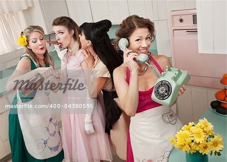 Woman on phone while friends give young woman cigarette and alcohol in a retro styled kitchen scene