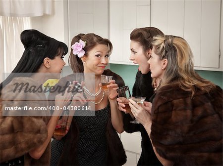 Four Caucasian women in mink coats smoking and drinking