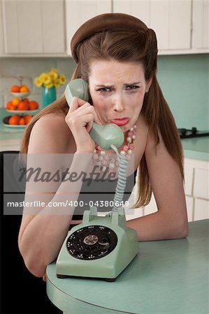 Mascara smeared housewife crys on phone in a retro-style scene