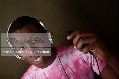 Handsome Black man with headphones and mp3 player