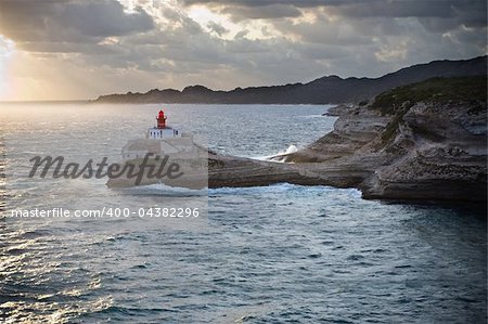 Red lighthouse on rocks in Bonifacio, Corsica, France