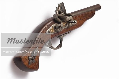 a wooden ancient gun isolated on a white background